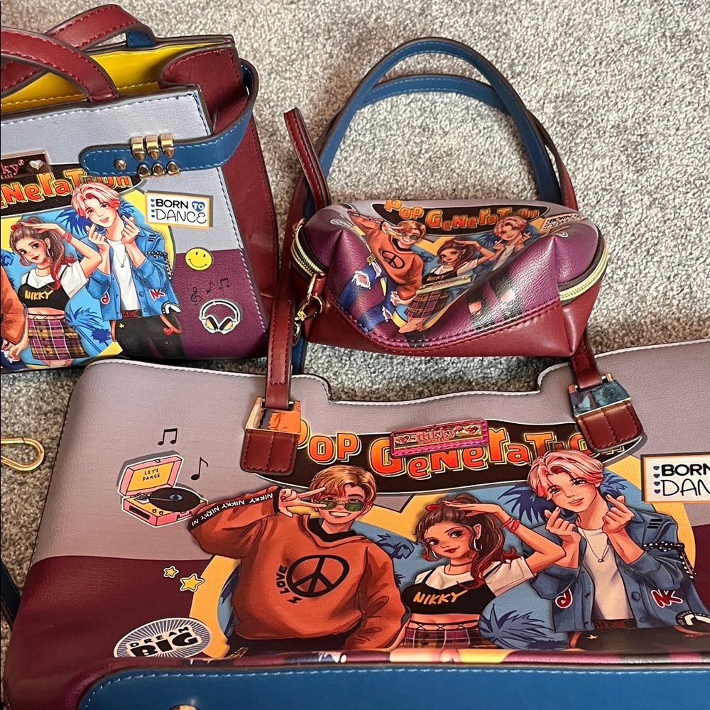 Brand new 4 piece Nikki set 2 purses , coin purse and cosmetic bag great price!